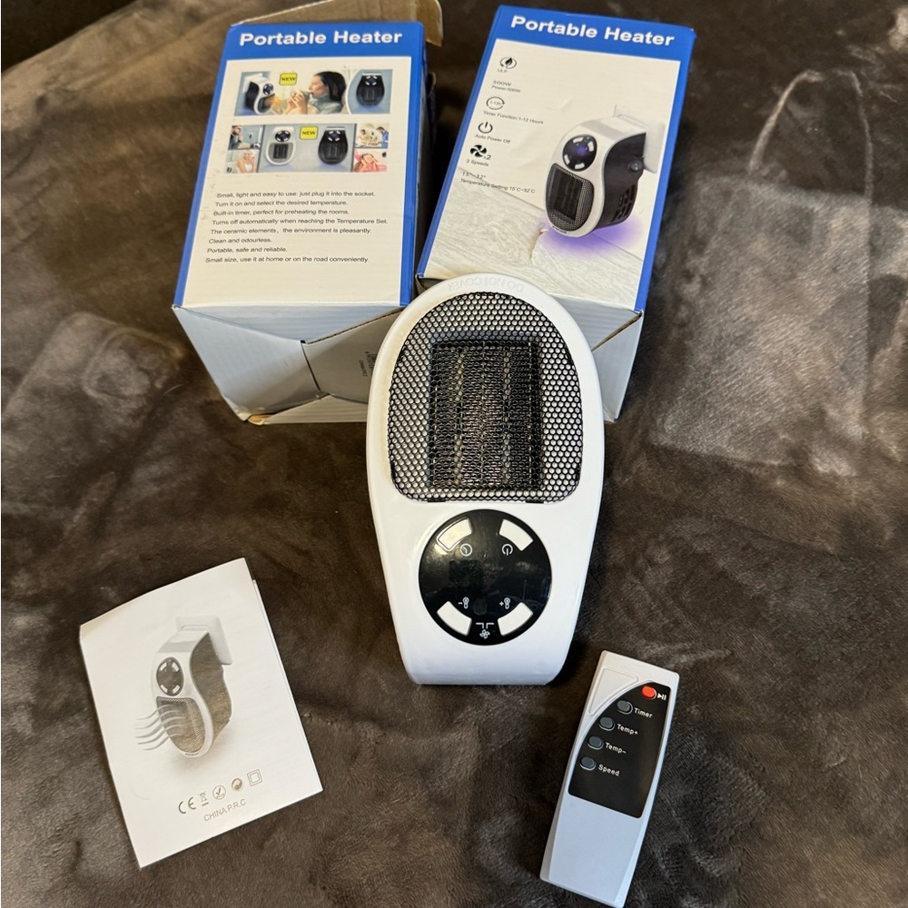 Set of 3 portable plug in heaters! All new!